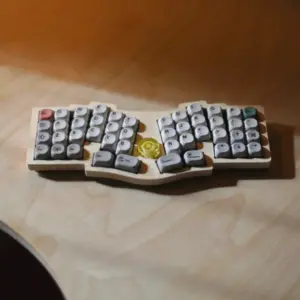 PandaKB DeLast ergonomic keyboard - marine ply top, cork base, encoder knob, 46-key ergonomic layout, retro style