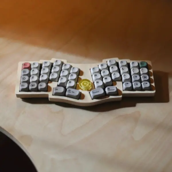 PandaKB DeLast ergonomic keyboard - marine ply top, cork base, encoder knob, 46-key ergonomic layout, retro style